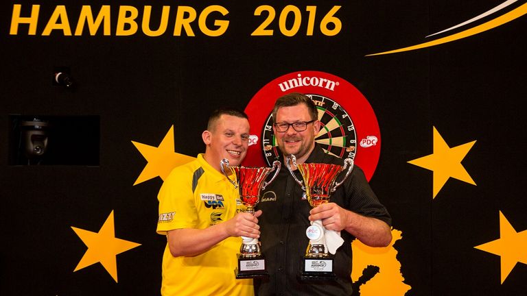 Dave Chisnall (left) and James Wade display their trophies after the final of the European Darts Matchplay
