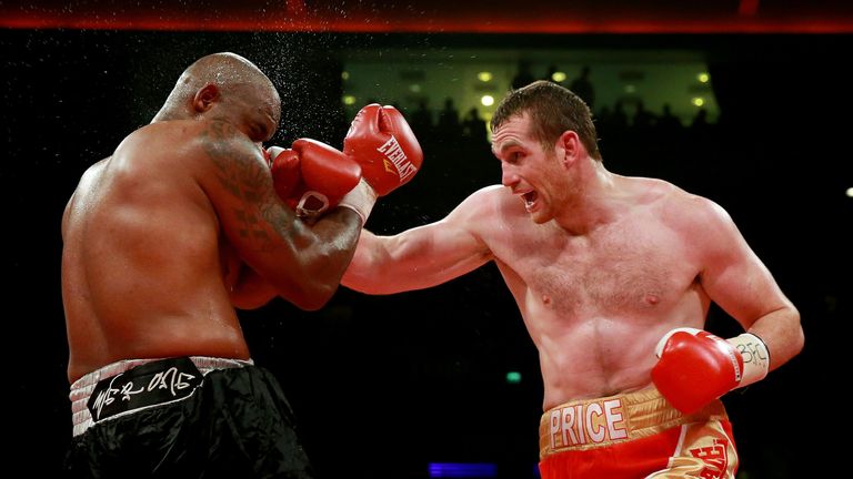 David Price of England (R) in action with Tony Thompson of United States during their International Heavyweight Fight on Jul