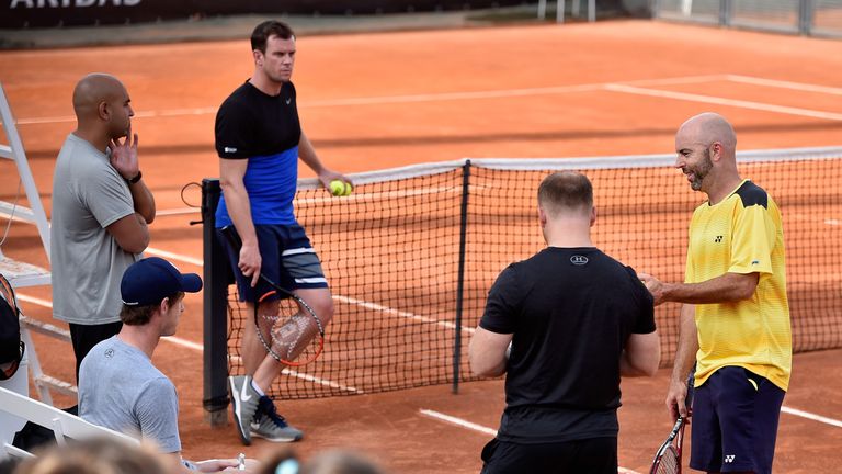 Andy Murray and Jamie Delgado (right) in a training session in Italy last week