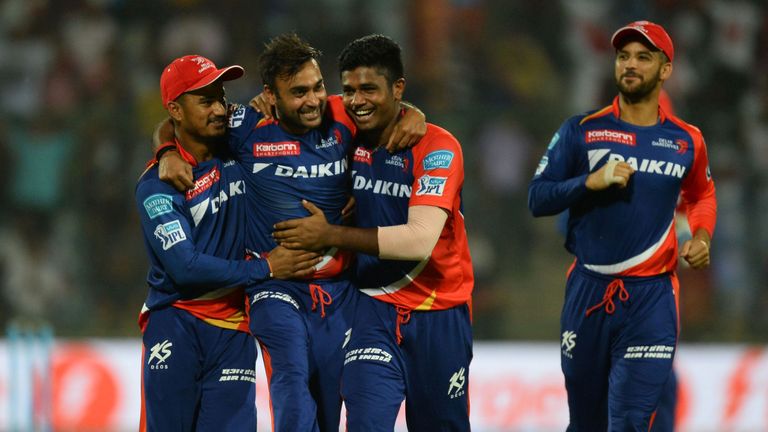 Delhi Daredevils bowler Amit Mishra(2L)celebrates with teammates after he dismissed Kings XI Punjab batsman Glen Maxwell during the 2016 Indian Premier Lea