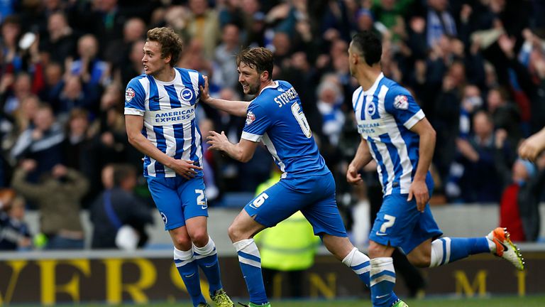 Brighton's James Wilson (left) celebrates after scoring against Derby