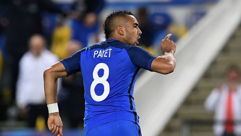 France forward Dimitri Payet celebrates after scoring the winner against Cameroon
