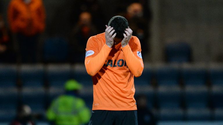 02/05/16 LADBROKES PREMIERSHIP.DUNDEE v DUNDEE UNITED.DENS PARK - DUNDEE.Dejection for Dundee United's Mark Durnan