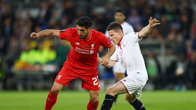 Emre Can of Liverpool and Kevin Gameiro of Sevilla compete for the ball during the UEFA Europa League Final match between Live