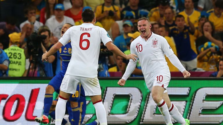 DONETSK, UKRAINE - JUNE 19:  Wayne Rooney of England celebrates scoring their first goal with John Terry of England during the UEFA EURO 2012 group D match