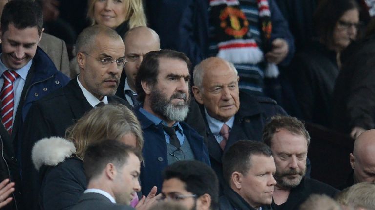 Manchester United former player Eric Cantona (C) arrives