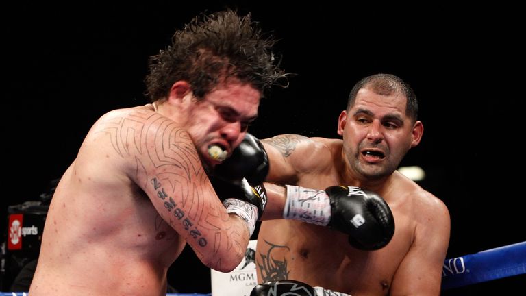Raphael Zumbano (L) takes a punch from Eric Molina during their heavyweight fight at the MGM Grand Garden Arena on January 17,