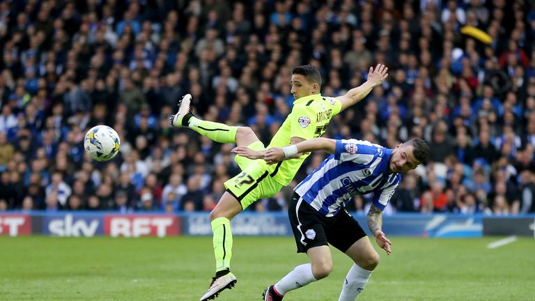 Sheffield Wednesday's Daniel Pudil (right) and Brighton's Anthony Knockaert battle for the ball