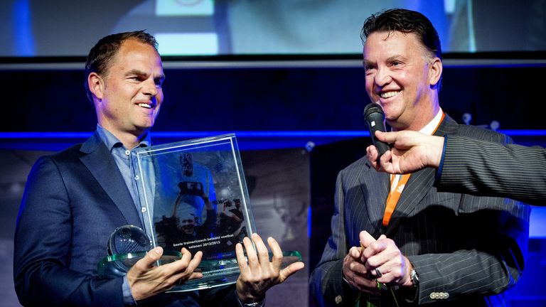 Frank de Boer of Ajax receives the Rinus Michels Award from trainer Louis van Gaal in Zwolle on May 10, 2013