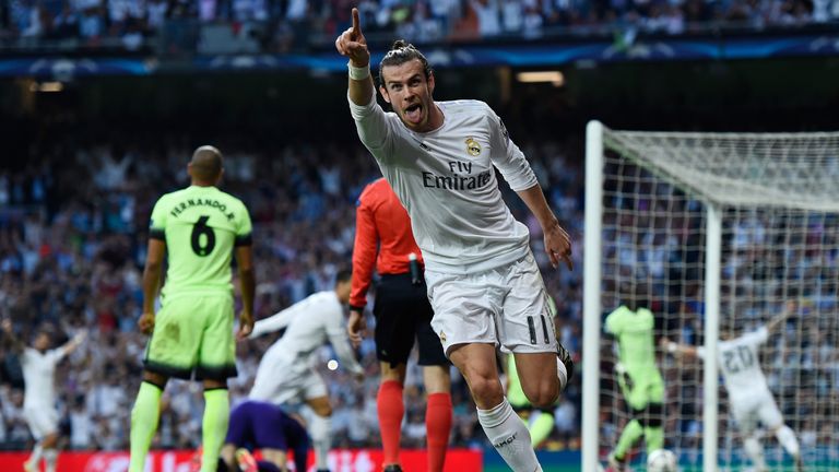 Gareth Bale celebrates scoring against Man City