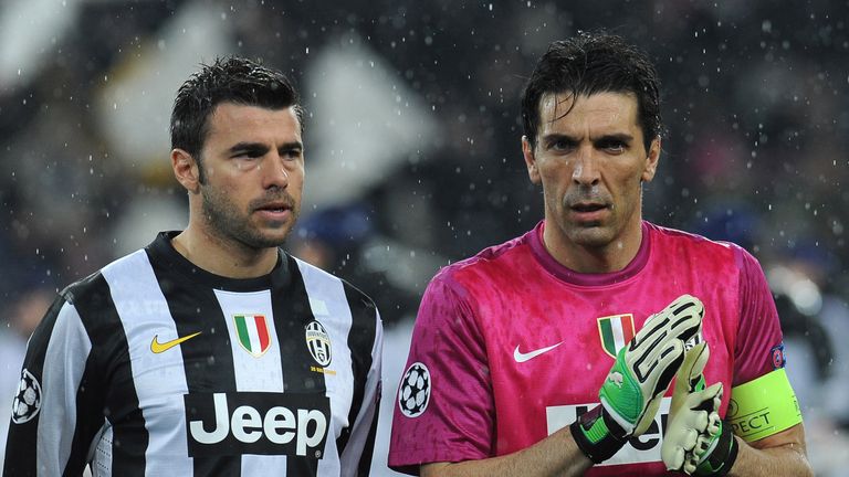 TURIN, ITALY - MARCH 06:  Gianluigi Buffon (R) and Andrea Barzagli of Juventus look on prior to the UEFA Champions League round of 16 second leg match betw