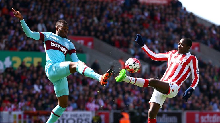 Giannelli Imbula of Stoke and West Ham's Diafra Sakho compete for the ball  