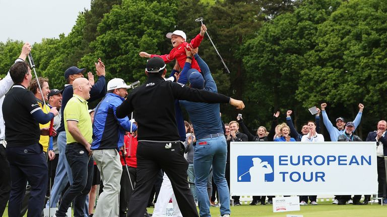 Jamie Sach aged 8 celebrates after holing a putt in the ISPS HANDA Pressure Putt Showdown prior to the BMW PGA Championship