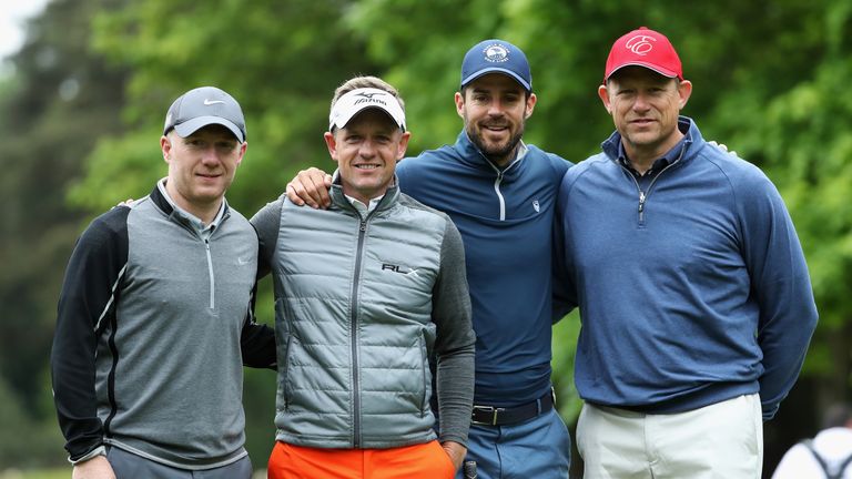 Former footballers Paul Scholes, (L) Peter Schmeichel (R) and Jamie Redknapp pose with Luke Donald of England during the BMW PGA pro-am