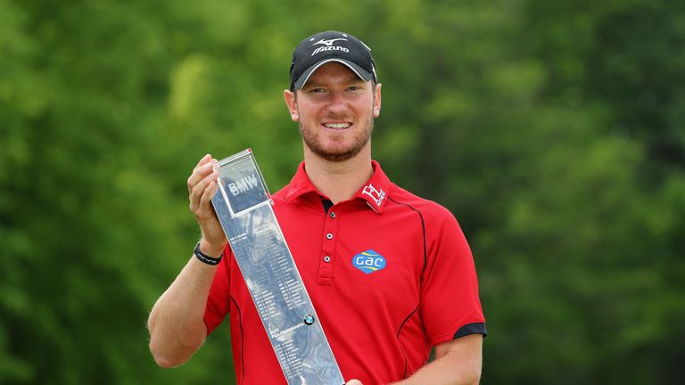 Chris Wood of England poses with the trophy following his victory during day four of the BMW PGA Championship at Wentworth