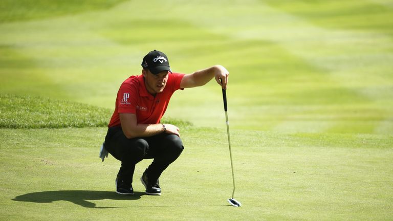 Danny Willett of England lines up on the 13th green during day one of the BMW PGA Championship at Wentworth on May 26