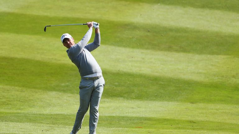 Danny Willett of England hits his 2nd shot on the 7th hole during day two of the BMW PGA Championship at Wentworth