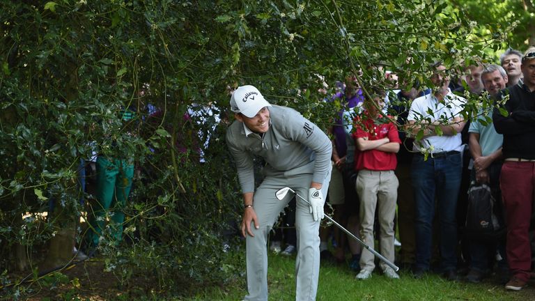 Danny Willett of England prepares to hit his 2nd shot on the  17th hole during day two of the BMW PGA Championship