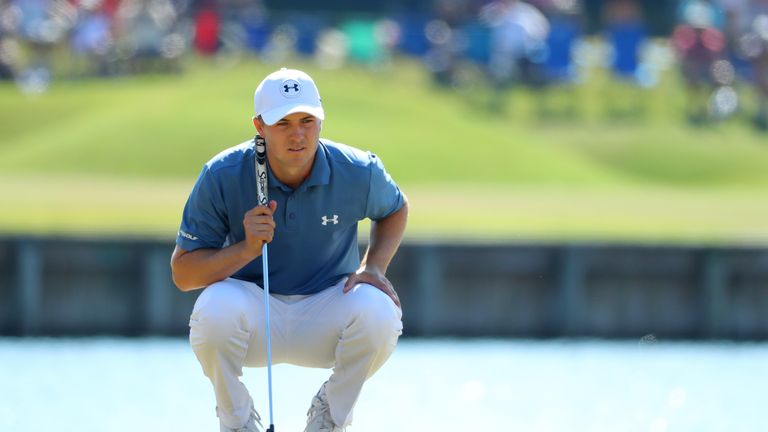 Jordan Spieth of the USA lines up a putt on the 17th green during the second round of the Players Championship at Sawgrass