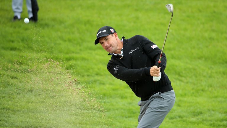 Padraig Harrington hits from a bunker on the 12th hole during a Pro-Am round ahead of the Irish Open at The K Club