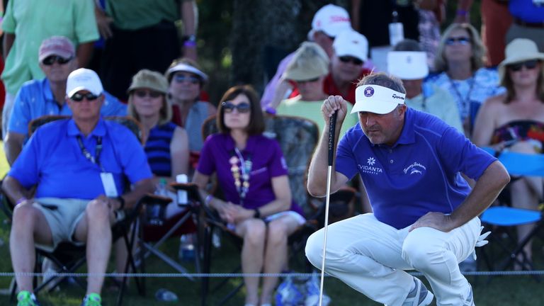 Ken Duke of the United States lines up a putt foir birdie on the ninth green during the third round of THE PLAYERS Championship at Sawgrass