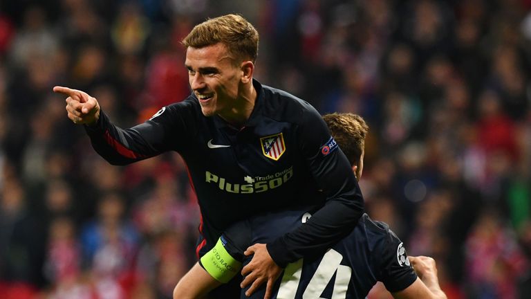 Antoine Griezmann celebrates scoring with his team-mates during the UEFA Champions League semi-final