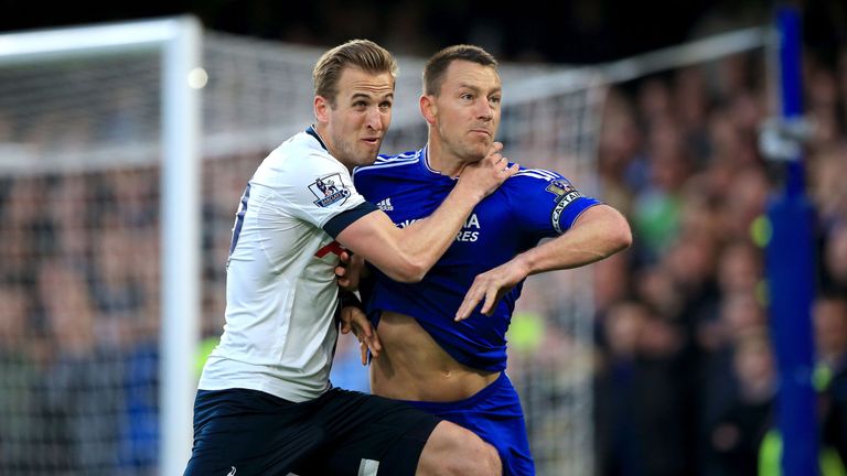 Tottenham Hotspur's Harry Kane (left) grapples with Chelsea's John Terry during the Barclays Premier League match at Stamford Bridge, London