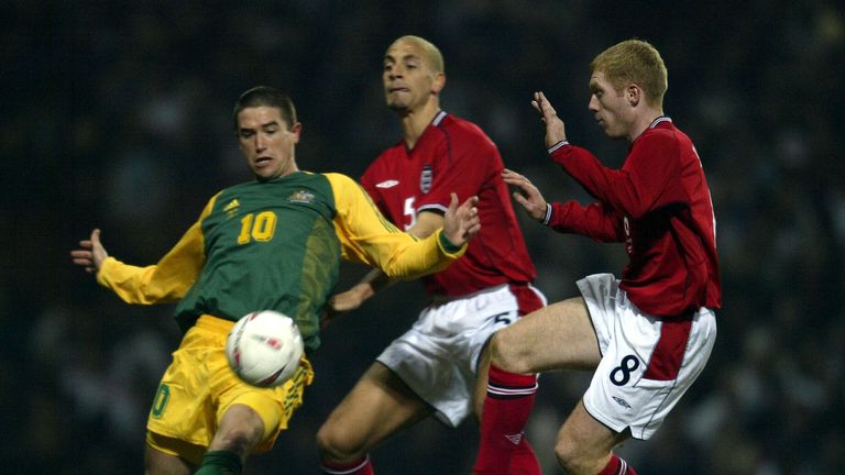 LONDON - FEBRUARY 12:  Harry Kewell of Australia battles with Rio Ferdinand and Paul Scholes of England at Upton Park in 2003