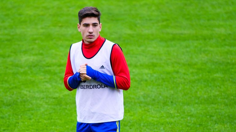 Hector Bellerin looks on during a Spain training session