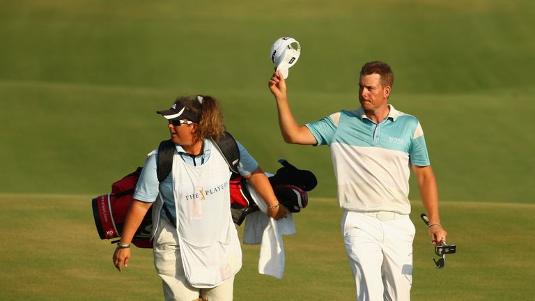 PONTE VEDRA BEACH, FL - MAY 10:  Henrik Stenson of Sweden walks with his caddie Fanny Sunesson to the 18th green during the final round of THE PLAYERS Cham