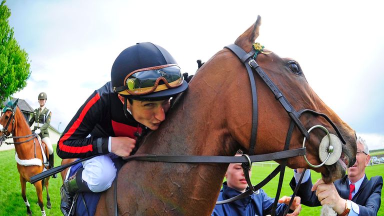 Jockey Shane Foley celebrates after winning the Tattersalls Irish 1,000 Guineas on Jet Setting.