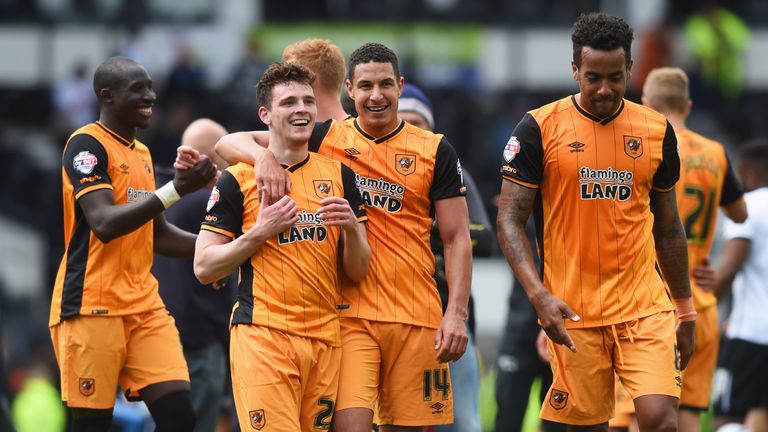 Andrew Robertson (26) and Jake Livermore (14) of Hull City celebrate victory at Derby with team mates, Sky Bet Championship play-offs