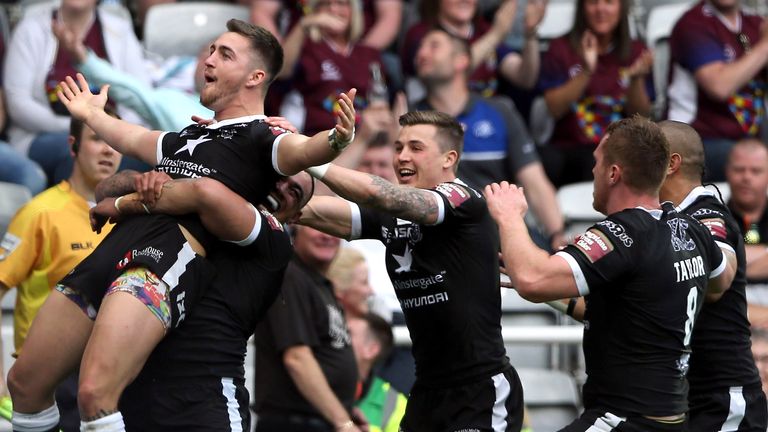 Curtis Naughton of Hull FC celebrates scoring a try against Hull KR during Super League's Magic Weekend