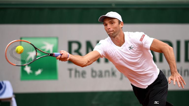 PARIS, FRANCE - MAY 27:  Ivo Karlovic of Croatia hits a forehand during the Men's Singles third round match against Andy Murray of Great Britain on day six