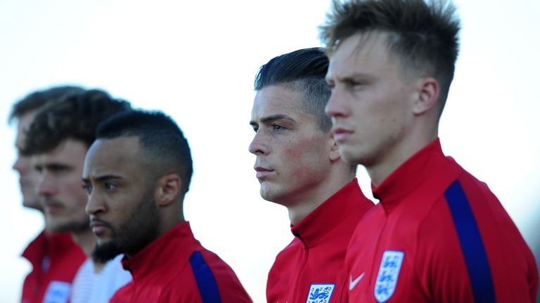 Jack Grealish (second right) lines up for England's U21s before making his debut against Portugal as a second-half substitute