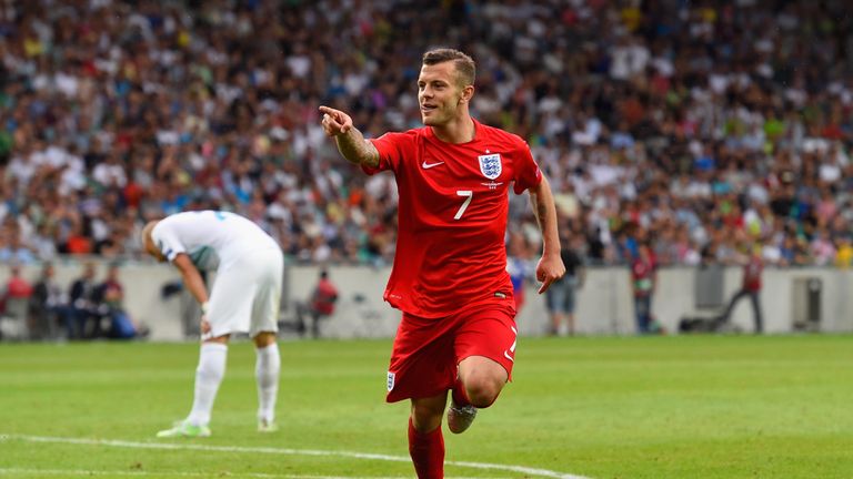 Jack Wilshere celebrates scoring England's second goal against Slovenia