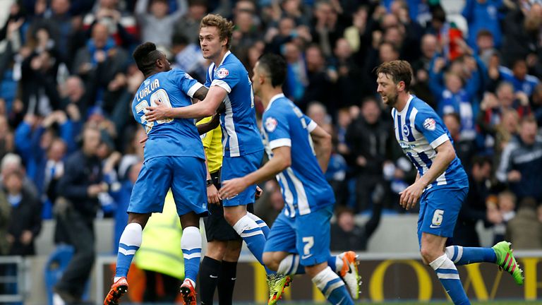 Brighton's James Wilson (second left) celebrates scoring his side's goal against Derby