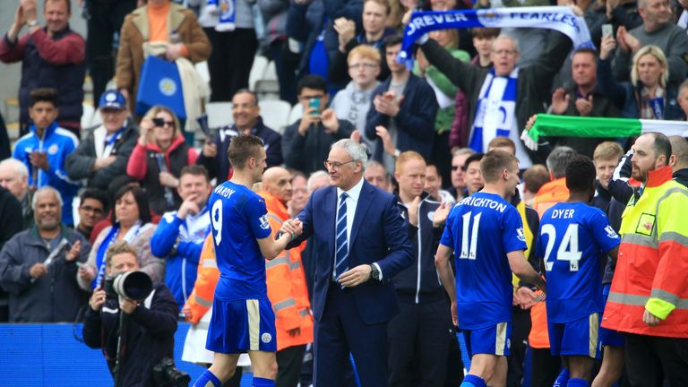 Leicester City manager Claudio Ranieri (centre) celebrates their victory with Jamie Vardy 