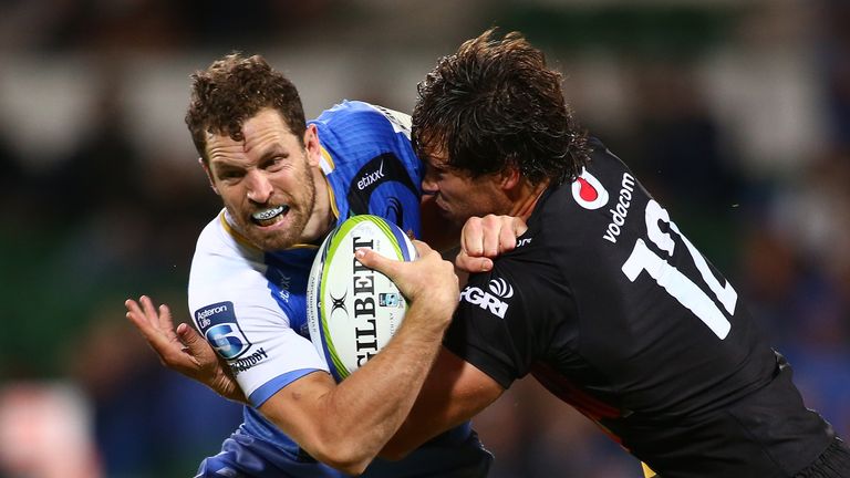 PERTH, AUSTRALIA - APRIL 29: Jan Serfontein of the Bulls tackles Luke Morahan of the Force during the round 10 Super Rugby match between the Force and the 