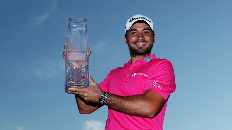 Jason Day celebrates with the trophy after winning during the final round of THE PLAYERS Championship at TPC Sawgrass, Ponte Vedra Beach, Florida