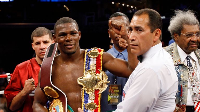 MEMPHIS, TN - MAY 19:  Jermain Taylor holds the WBC and WBO World Middleweight Championship belts after the fight against Cory Spinks at FedExForum on May 
