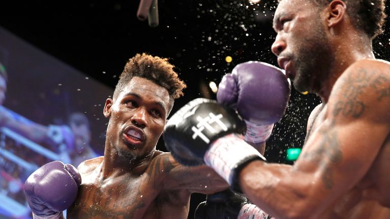 Jermall Charlo (l) punches Austin Trout