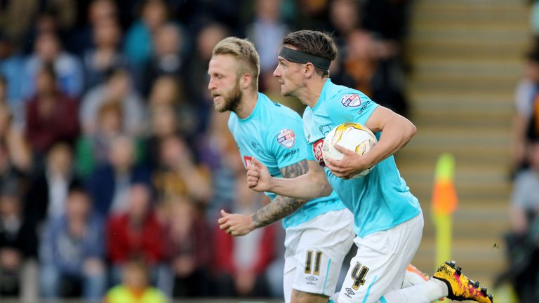 Derby County's Johnny Russell  celebrates with Craig Bryson