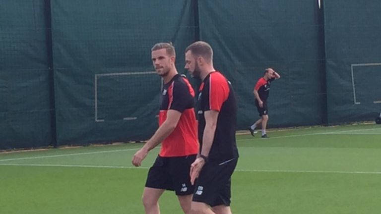 Jordan Henderson joins in training at Liverpool as he continues his recovery from injury