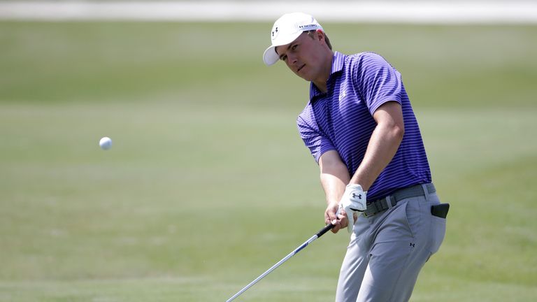 Jordan Spieth plays a shot during a practice round prior to THE PLAYERS Championship at the TPC Stadium course