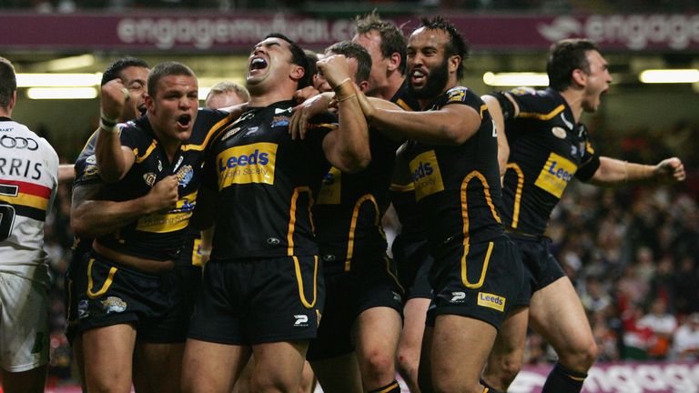 Jordan Tansey (L) of the Rhinos celebrates with teammates after scoring the matchwinning try in injury time 
