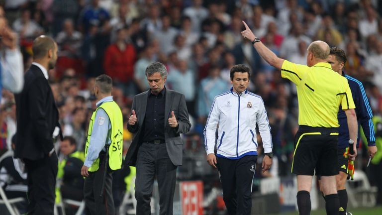 MADRID, SPAIN - APRIL 27:  Jose Mourinho the coach of Real Madrid gives a thumbs up to the assistant referee as he is sent off to the stands during the UEF
