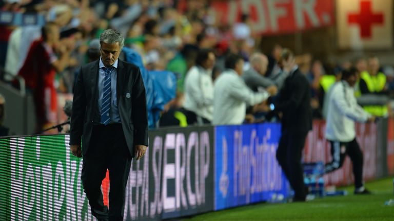 PRAGUE, CZECH REPUBLIC - AUGUST 30:  A dejected Jose Mourinho, manager of Chelsea walks along the touchline during the UEFA Super Cup between Bayern Muench