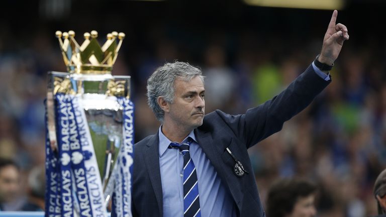 Chelsea's Portuguese manager Jose Mourinho (R) gestures during the presentation of the Premier League trophy after the English Premier League football matc
