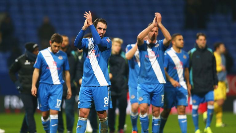 BOLTON, ENGLAND - JANUARY 19: Josh Payne of Eastleigh applauds the supporters after the Emirates FA Cup Third Round Replay match between Bolton Wanderers a